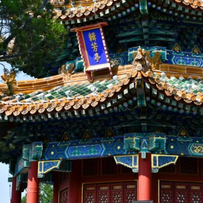 A chinese pagoda with blue and red decorations